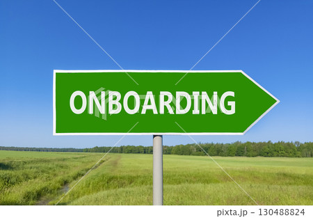 Onboarding success symbol. Concept word Onboarding on beautiful green road sign. Beautiful blue sky green grass and forest peaceful nature background. Business onboarding success concept. Copy space. 130488824