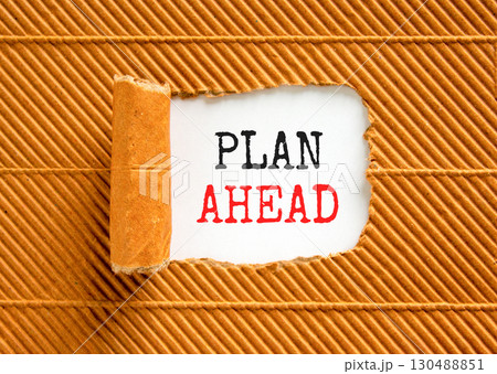 Plan ahead symbol. Concept word Plan ahead on beautiful white paper. Beautiful brown paper background. Business plan ahead concept. Copy space. 130488851