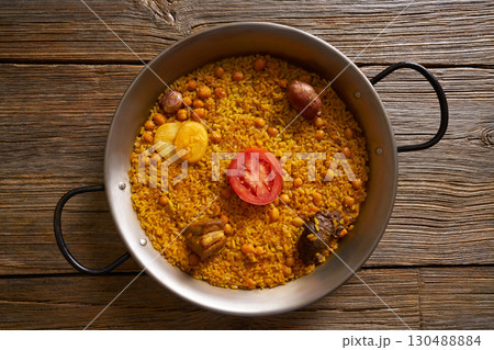 Baked rice Paella recipe from Spain 130488884