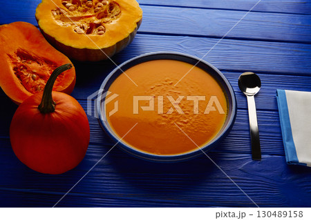 Pumpkin soup cream on wood Pumpkin soup cream on wood 130489158