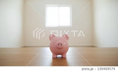 部屋にあるブタの貯金箱 130489574