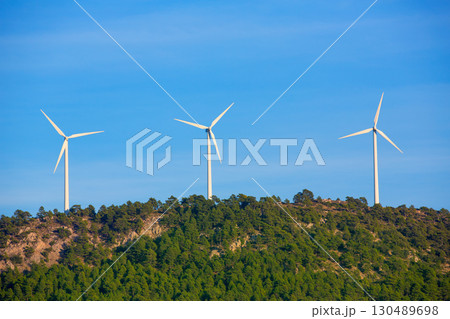 Aerogenerator windmills in the mountain top 130489698