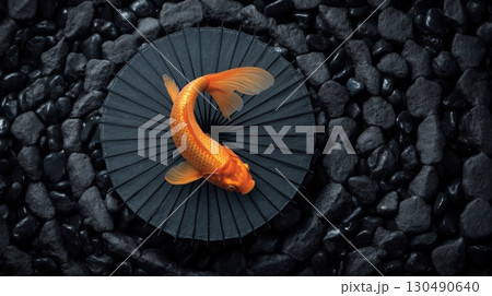 Golden Koi on Black Stones and Umbrella 130490640