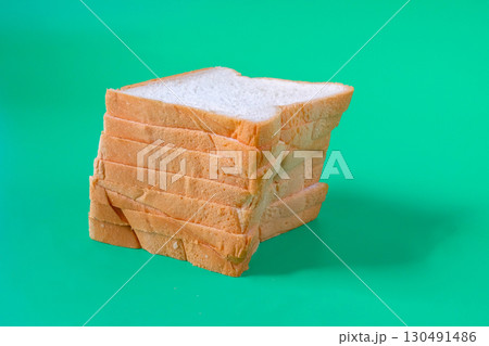 Fresh slices white bread on color background. 130491486