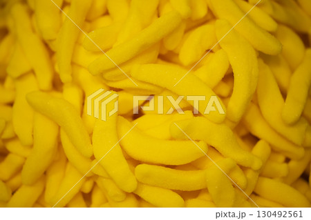 Sweets background. Bright gummy candies close-up. Close-up of colorful jujube background pattern Sweets background. Bright gummy candies close-up. Close-up of colorful jujube background pattern 130492561