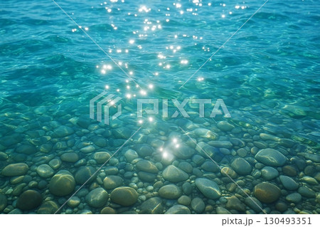 Cinematic Close-Up of Kanzaki River Turquoise Water with Sunlight Reflections 130493351