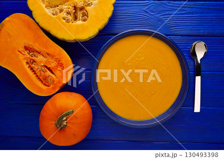 Pumpkin soup cream on wood Pumpkin soup cream on wood 130493398