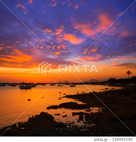 Formentera sunset in Estany des Peix with Ibiza Es vedra Formentera sunset in Estany des Peix with Ibiza Es vedra 130493595