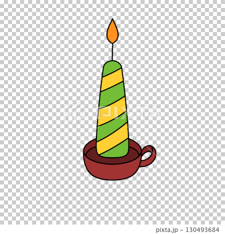 A green and yellow candle with a yellow stripe on it is lit A green and yellow candle with a yellow stripe on it is lit 130493684