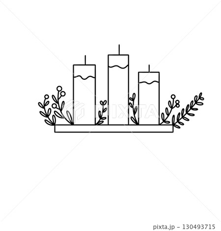 Three candles are lit and surrounded by leaves 130493715