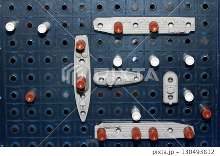 Close up of strategic battleships board game with ships and pegs 130493812