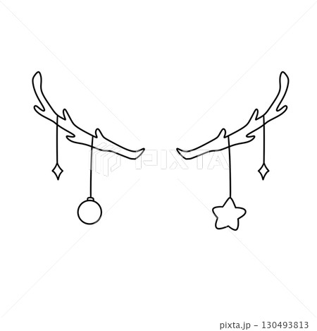 Two antlers with a star and a ball hanging from them Two antlers with a star and a ball hanging from them 130493813