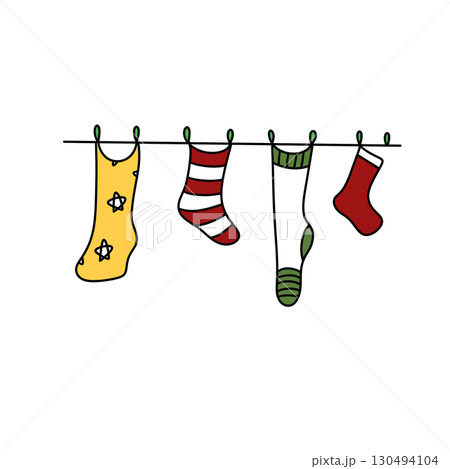 A line of socks hanging on a clothesline, including a yellow dress sock, a red 130494104