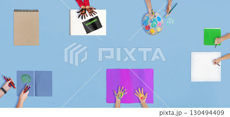 Children painting and working together with teacher. Together painting concept. Children painting and working together with teacher. Together painting concept. 130494409