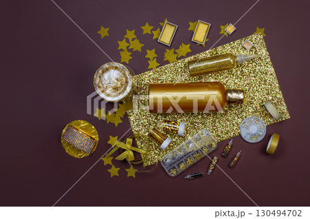 During the gilding gold process tecnique. Expertise decorating items with gold colored in workshop. During the gilding gold process tecnique. Expertise decorating items with gold colored in workshop. 130494702