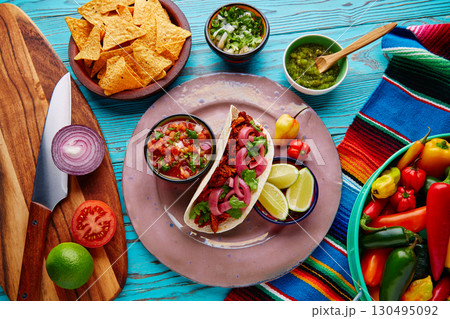 Cochinita Pibil Mexican food with pico de gallo Cochinita Pibil Mexican food with pico de gallo 130495092