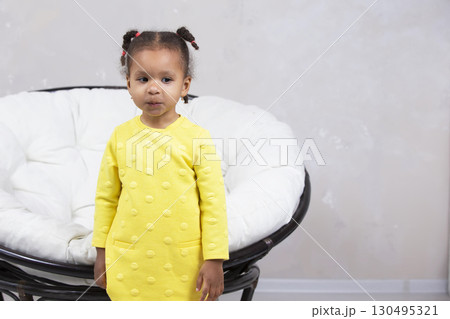 Little African American girl at home.Little African American girl Little African American girl at home.Little African American girl 130495321
