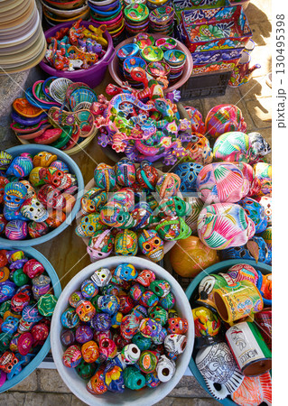 Mexican souvenirs colorful handpainted crafts 130495398