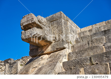Chichen Itza snake head Yucatan Mexico Chichen Itza snake head Yucatan Mexico 130495479
