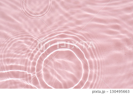 Abstract pink water background with streaks of water. Abstract pink water background with streaks of water. 130495663