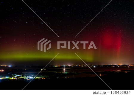 The Aurora Borealis, the northern lights, showing up above Maghery, Burtonport, Arranmore and Dungloe in County Donegal, Ireland. 130495924