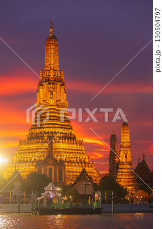 Twilight view of Wat Arun Ratchawararam Ratchawaramahawihan at sunset in bangkok Thailand. Landmark of Along the Chao Phraya River Thailand 130504797
