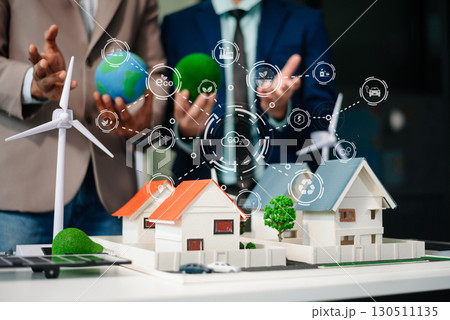 Business team people planning hand using laptop for working technology and business Net zero and carbon neutral concept.NET ZERO 130511135