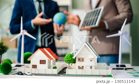 Real estate broker agent presenting and consult to customer to decision making sign insurance form agreement, home model 130511143