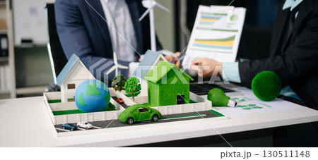 Business team people planning hand using laptop for working technology and business Net zero and carbon neutral concept.NET ZERO Business team people planning hand using laptop for working technology and business Net zero and carbon neutral concept.NET ZERO 130511148