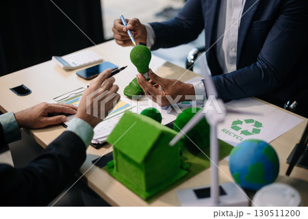 business team people planning and discussing on recycle reduce reuse policy symbol in office meeting room. Green business company 130511200