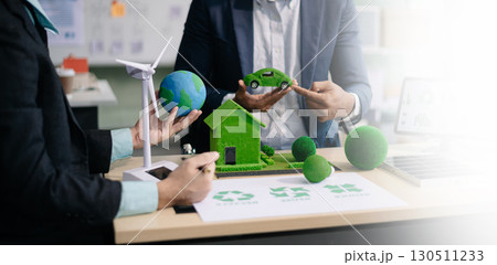 Business team people planning hand using laptop for working technology and business Net zero and carbon neutral concept.NET ZERO Business team people planning hand using laptop for working technology and business Net zero and carbon neutral concept.NET ZERO 130511233