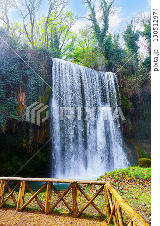 Stunning waterfall cascading in monasterio de piedra natural park, spain Stunning waterfall cascading in monasterio de piedra natural park, spain 130512974