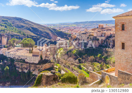 Cuenca cityscape featuring the hanging houses, spain, during a sunny spring day Cuenca cityscape featuring the hanging houses, spain, during a sunny spring day 130512980