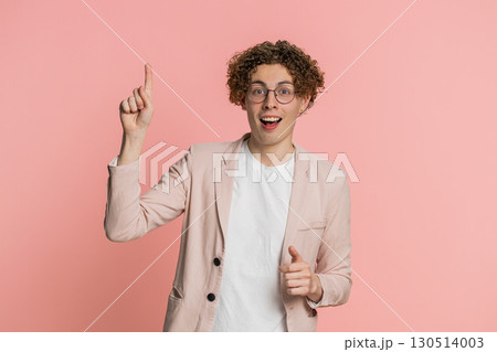 Inspired young man having good idea, plan, startup, showing inspiration motivation Eureka gesture Inspired young man having good idea, plan, startup, showing inspiration motivation Eureka gesture 130514003