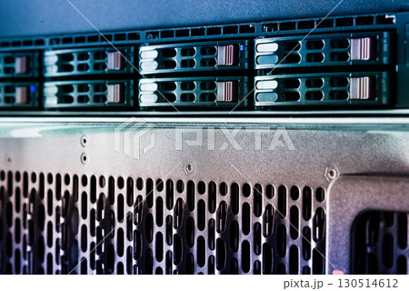 Array of data storage hard drives in internet data center 130514612