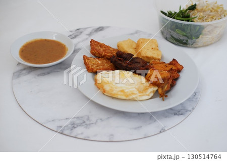 Homemade Indonesian Meal with Tempeh and Tofu 130514764
