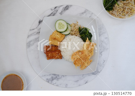 Homemade Indonesian Meal with Tempeh and Tofu 130514770