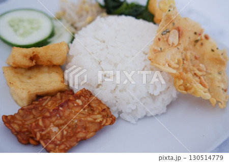 Homemade Indonesian Meal with Tempeh and Tofu Homemade Indonesian Meal with Tempeh and Tofu 130514779