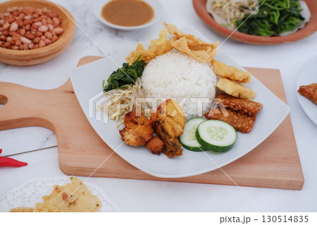 Homemade Indonesian Meal with Tempeh and Tofu Homemade Indonesian Meal with Tempeh and Tofu 130514835