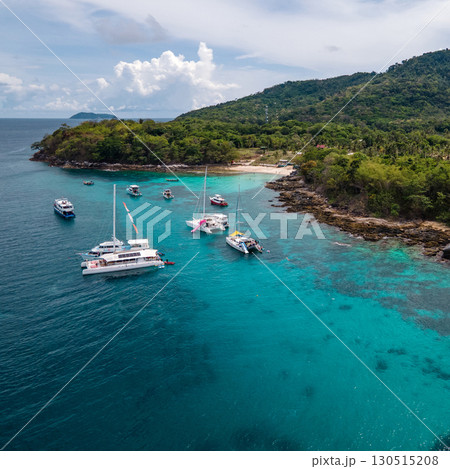 Aerial view of Koh Racha Yai Island with many tour boats around the bay in Phuket, Thailand. 130515208
