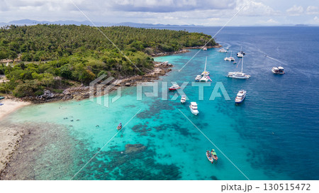 Aerial view of Koh Racha Yai Island with many tour boats in Phuket, Thailand. Aerial view of Koh Racha Yai Island with many tour boats in Phuket, Thailand. 130515472