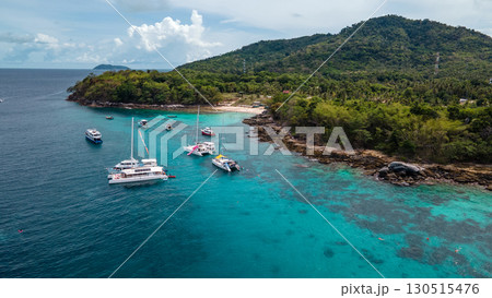 Aerial view of Koh Racha Yai Island with many tour boats in Phuket, Thailand. Aerial view of Koh Racha Yai Island with many tour boats in Phuket, Thailand. 130515476