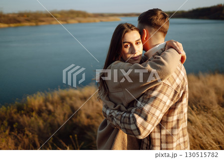 Stylish couple walking autumn weather. People, lifestyle, relaxation concept. Autumn Fashion concept 130515782