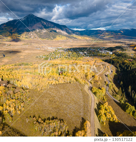 Aerial view of beautiful fall foliage landscape during golden sunset at Crested Butte, Colorado, USA Aerial view of beautiful fall foliage landscape during golden sunset at Crested Butte, Colorado, USA 130517122