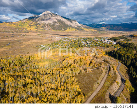 Aerial view of beautiful fall foliage landscape during golden sunset at Crested Butte, Colorado, USA Aerial view of beautiful fall foliage landscape during golden sunset at Crested Butte, Colorado, USA 130517141