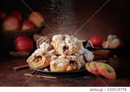 Homemade mini apple strudels with apples and cinnamon. Homemade mini apple strudels with apples and cinnamon. 130519776