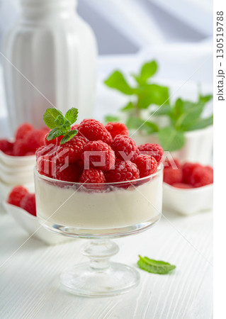 Panna cotta with fresh raspberries. Panna cotta with fresh raspberries. 130519788