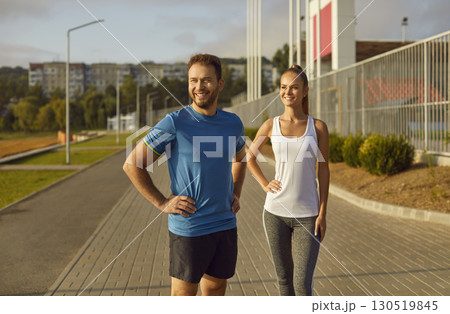 Happy Sport Team Of Man And Woman Training Outdoors In City Park 130519845