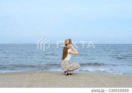 woman on the beach 130520569