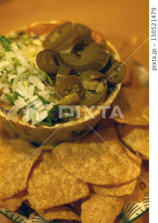 mexican food with tacos guacamole and nachos 130521479